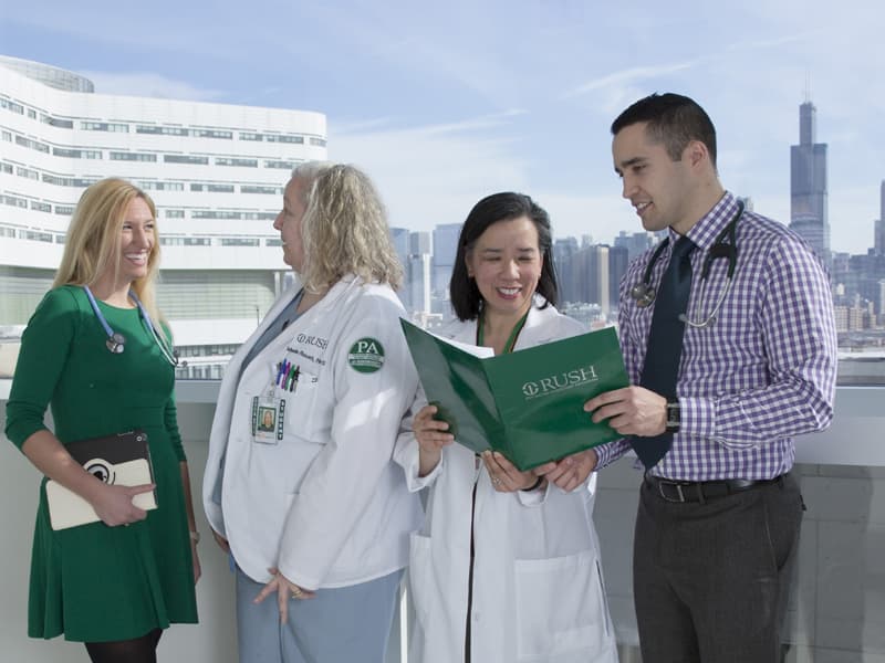 A group standing on a rooftop